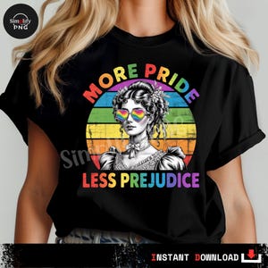 May include: Black t-shirt with a graphic featuring a woman wearing heart-shaped rainbow sunglasses, set against a rainbow striped background. The text reads "MORE PRIDE LESS PREJUDICE".
