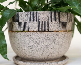 Wheel thrown speckled stoneware planter with drainage dish