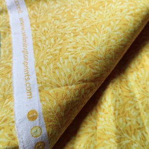 Underwater Whimsey by Jo Taylor for Wilmington Prints 75509-555 cotton fabric- sunshine yellow leaves