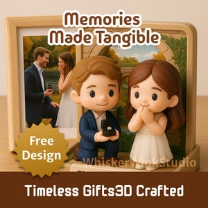 May include: A 3D-crafted engagement gift featuring a miniature couple figurine. The male figure kneels, presenting a ring, while the female figure clasps her hands. A framed photo of a proposal scene is in the background. The text reads "Memories Made Tangible."