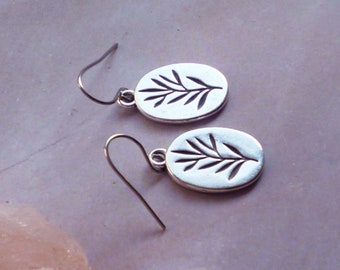 Silver leaf earrings. Choose 925 sterling silver, nickel free titanium or stainless steel. Hypoallergenic, silver disc with leaf imprint