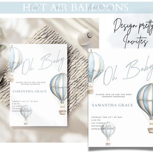 May include: Baby shower invitations with watercolour hot air balloons in blue and white. The invitations say "Oh Baby" and include event details: date, time, and location. The words "Design pretty Invites" are also visible on the invitation.