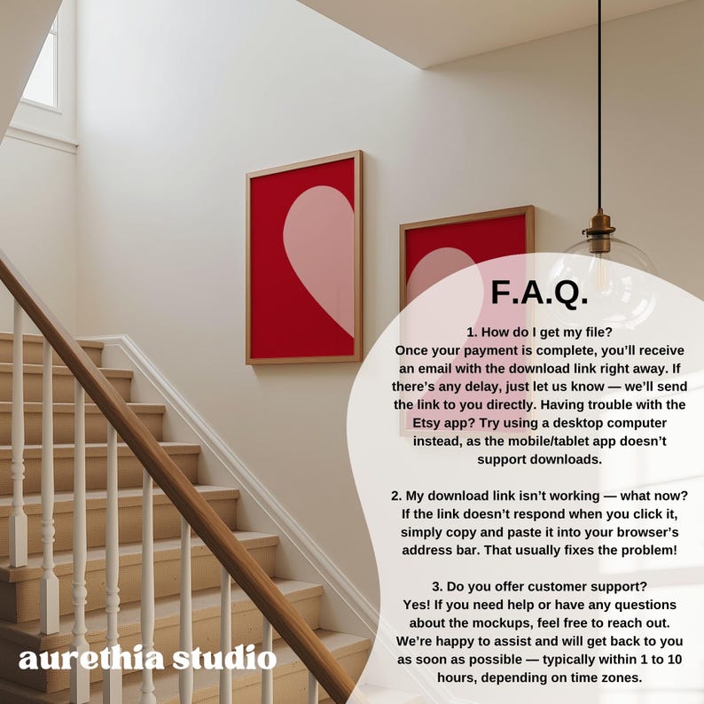 May include: Two framed art prints with a heart design in a red and pink color scheme hang on a white wall. A wooden staircase with a curved handrail is in the foreground. The text "F.A.Q." and other text is visible.