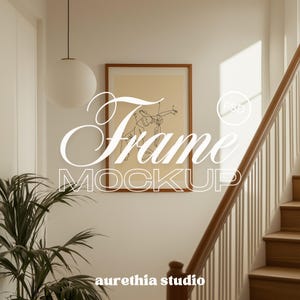 May include: A framed art print mockup with the text "Frame MOCKUP" in a modern font. The artwork features a minimalist line drawing. The scene includes a staircase with a wooden handrail and a hanging globe light.