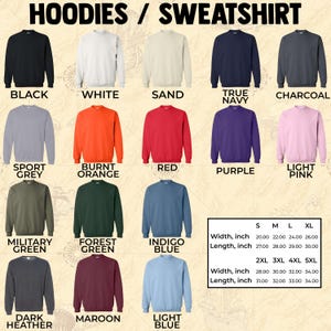 K&ouml;nnte beinhalten: Eine Auswahl an Rundhals-Sweatshirts in verschiedenen Farben, darunter Schwarz, Wei&szlig; und Rot. Das Bild zeigt die Sweatshirts mit den Farbbezeichnungen darunter. Eine Gr&ouml;&szlig;entabelle mit Breiten- und L&auml;ngenma&szlig;en in Zoll (ca. 51-86 cm) ist ebenfalls enthalten.
