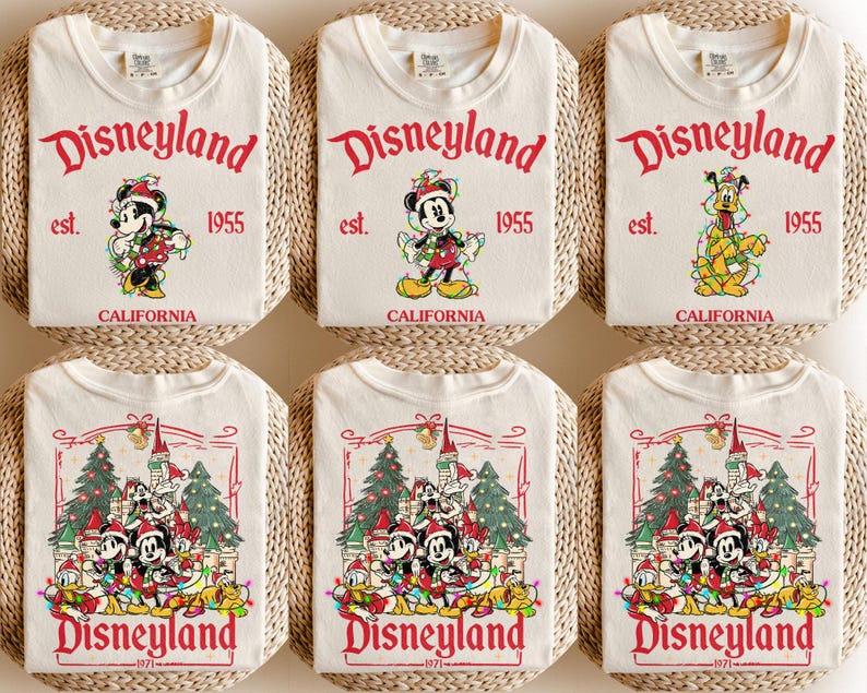 May include: Cream-colored t-shirts with the Disneyland logo in red, featuring Mickey Mouse, Pluto, and a group of Disney characters. The shirts have the text "est. 1955 CALIFORNIA" and "1971" printed on them.