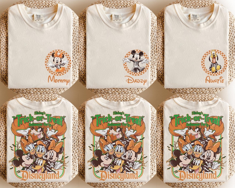 May include: Six off-white t-shirts. The top row features circular checkered patches with skeleton-costumed characters and text reading Mommy, Daddy, and Auntie. The bottom row displays a large graphic with Disney characters and Trick-or-Treat text.
