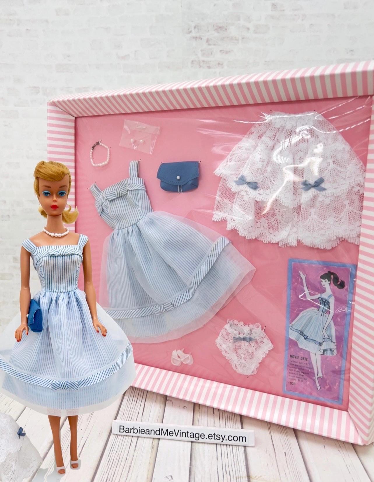 barbie pink and blue dress movie Barbie the Movie Margot Robbie Doll in Pink Dress