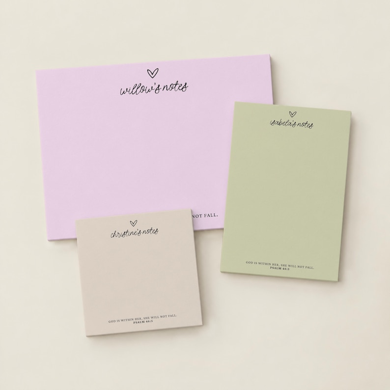 May include: Three rectangular notepads in light purple, sage green, and beige. The purple pad reads willow's notes, the green pad reads isabela's notes, and the beige pad reads christine's notes. Each includes a heart icon and Psalm 46:5.