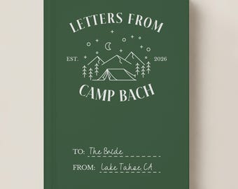 May include: A dark green hardcover book featuring white line art of a tent, mountains, trees, and stars. Text reads: LETTERS FROM CAMP BACH EST. 2026, TO: The Bride, and FROM: Lake Tahoe, CA with dashed lines for writing.
