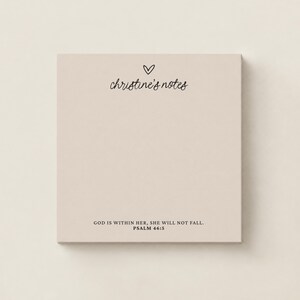 May include: A square notepad with a light beige background. The top features a small hand-drawn heart icon above the text christine's notes in a cursive font. The bottom includes the text GOD IS WITHIN HER, SHE WILL NOT FALL. PSALM 46:5.