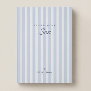 May include: A rectangular hardcover book featuring a light blue and white vertical striped pattern. The front cover displays the dark blue text "LETTERS TO MY Son" followed by a small heart icon and the text "LOVE, MOM" centered below.