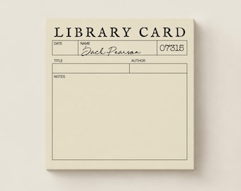 May include: A square cream-colored notepad featuring a black printed library card design. The text reads LIBRARY CARD, DATE, NAME, 07315, TITLE, AUTHOR, and NOTES. The name Jack Pearson is written in black cursive script on the name line.