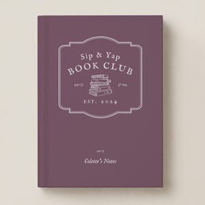May include: A dark purple hardcover book featuring a white line-art graphic of a stack of books centered within a decorative frame. The text reads Sip & Yap BOOK CLUB EST. 2024 and Colette's Notes at the bottom in a clean white serif font.