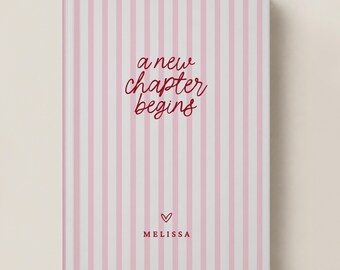 May include: A rectangular notebook featuring a vertical light pink and white striped pattern. The front cover displays the dark red cursive text "a new chapter begins" above a small heart icon and the name "MELISSA" in capital letters.