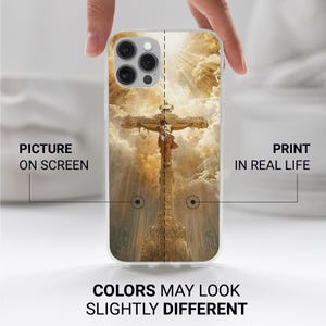 May include: A clear phone case featuring a religious image of Jesus on the cross, set against a backdrop of a cloudy sky with sun rays. The text on the case reads "PICTURE ON SCREEN" and "PRINT IN REAL LIFE". The bottom text says "COLORS MAY LOOK SLIGHTLY DIFFERENT".