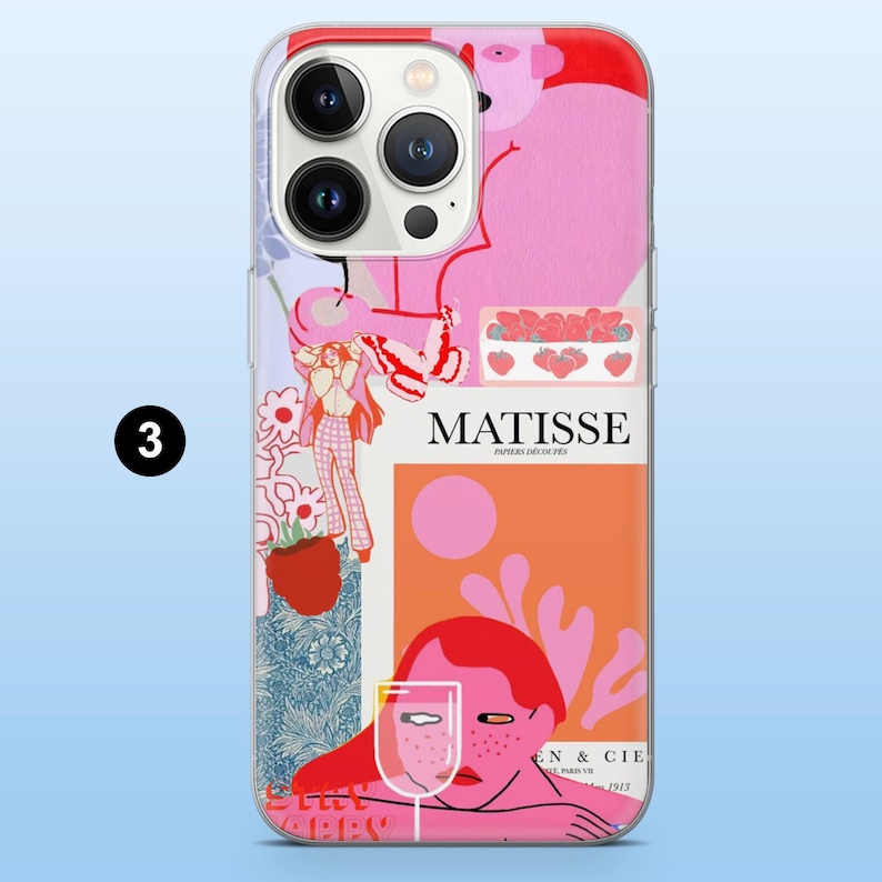 May include: A clear phone case featuring a colorful Matisse-inspired design. The artwork includes pink, orange, and blue elements, with the word "MATISSE" prominently displayed. A number "3" is visible in the corner.