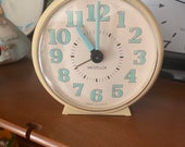 White and Turquoise Westclox Table Clock