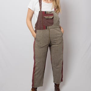 May include: A rustic wooden sign with the text "Welcome to our home" in white lettering. The sign features a distressed finish and a simple, inviting design, perfect for entryway decor.