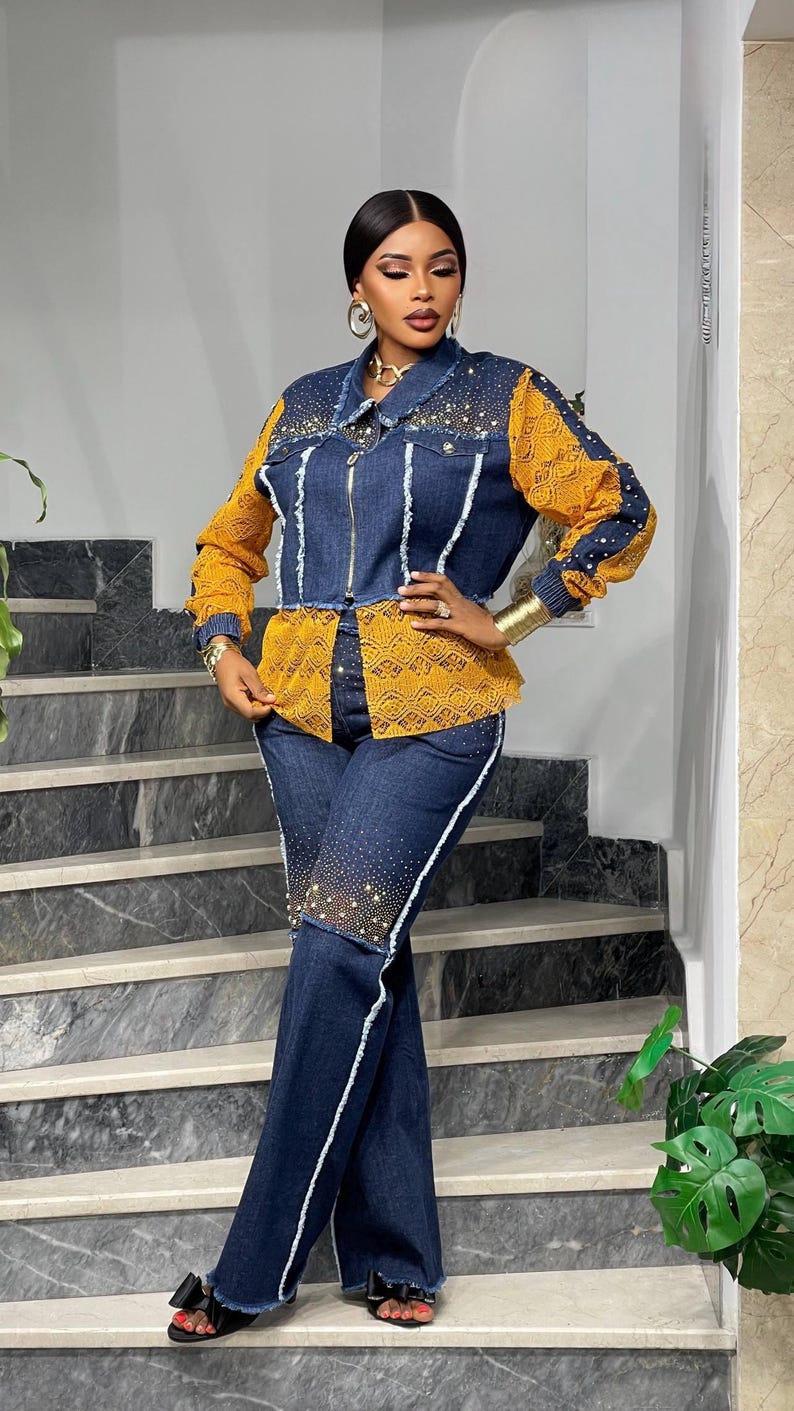 May include: A denim jacket and matching pants set. The jacket features yellow lace sleeves and a yellow lace panel on the front. The jeans have white trim and are embellished with rhinestones. The outfit is a stylish ensemble.