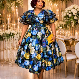 plus size tea party dresses Plus-Size Midi White Dress with Short Sleeves– PromGirl Drop WaistPleatedBack Zipper ClosureLinedLength Measured Flat = 32Self Women's Plus Size Evening Gowns