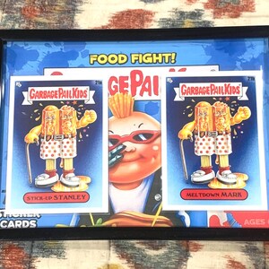 DPK 2021 Food Fight Series - 21a / b Stick-Up Stanley/Meltdown Mark - gerahmte Karten - Garbage Pail Kids