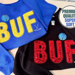 May include: A rustic wooden sign with the text "Welcome to our home" in a handwritten style. The sign features a distressed finish and a simple, inviting design, perfect for a front porch or entryway.