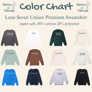 May include: A color chart for Lane Seven premium sweatshirts, composed of 80% cotton and 20% polyester. The chart displays twelve crewneck sweatshirts in various colors labeled Charcoal Heather, White, Sports Green, Sandshell, Sea Foam, Chestnut, Pale Pink, Oatmeal Heather, True Royal, Navy Blue, Heather Grey, and Black.