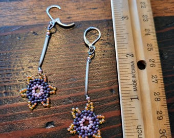 Pendientes colgantes de estrella con cuentas de vidrio y púas de puercoespín genuinas de origen ético.