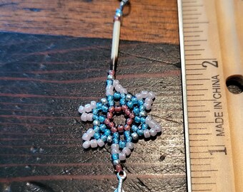 Pendientes de estrella hechos a mano con cuentas: diseño de púas de puercoespín con pluma