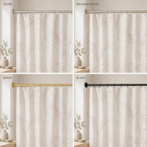 May include: A shower curtain featuring a white fabric with a subtle, light gray line-drawn ginkgo leaf pattern. The curtain is displayed on four different metal rods labeled silver, brushed nickel, brass, and black, each with matching rings.