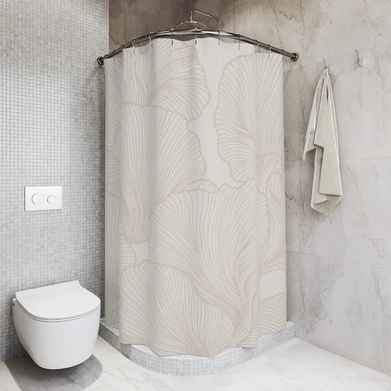 May include: A shower curtain featuring a repeating pattern of large, fan-shaped ginkgo leaves in soft beige and cream tones. The design consists of delicate, flowing lines that create a sense of movement across the fabric surface.
