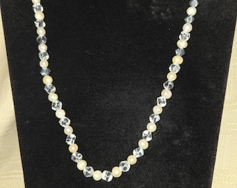 Vintage necklace with pearls and clear crystal beads.