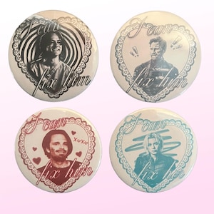 May include: A collection of four circular pin badges. Each badge displays a portrait within a heart-shaped border, accompanied by the text "I can fix him" or "I can fix her". The portraits are in monochrome or blue hues, with decorative heart and lace designs.