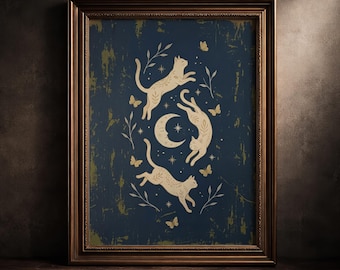 May include: A framed wall art print featuring a dark navy blue background with a distressed texture. The central design displays three cream-colored cats leaping around a crescent moon, surrounded by small stars, delicate leafy sprigs, and butterflies.