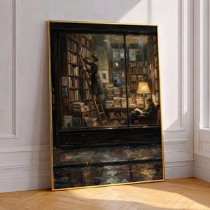 May include: A framed vertical wall art print depicting a dark, moody bookstore interior. One figure stands on a wooden ladder reaching for books on high shelves, while another figure sits in a chair reading under a warm, glowing table lamp.