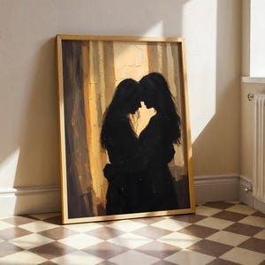 May include: A framed artwork featuring a silhouette of two figures embracing. The painting has a warm color palette with shades of brown and yellow. The artwork is leaning against a wall on a checkered floor.
