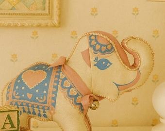 Vintage Calico Elephant Stuffed Animal – 1970s Fabric Soft Toy with Bell & Heart Blanket – Folk Art Style Nursery Decor
