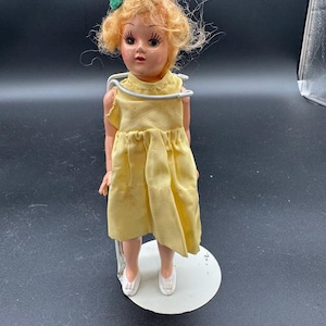 Vintage 1950s Hard Plastic Doll in Yellow Dress | Sleep Eyes | Blonde Hair | Springtime Charm