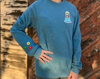 Embroidered Our Lady of Peace Sweatshirt | Catholic Trinity Sleeve Detail