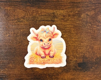 cute highland cow on a hay bail water proof sticker kindle sticker water bottle sticker