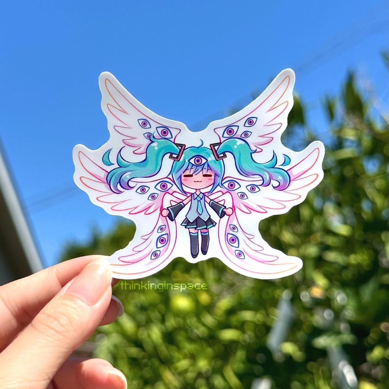 Silly vinyl sticker of Hatsune Miku drawn as a biblically accurate angel with many eyes and wings, surreal Vocaloid meme design, 3x3 inch handmade sticker.