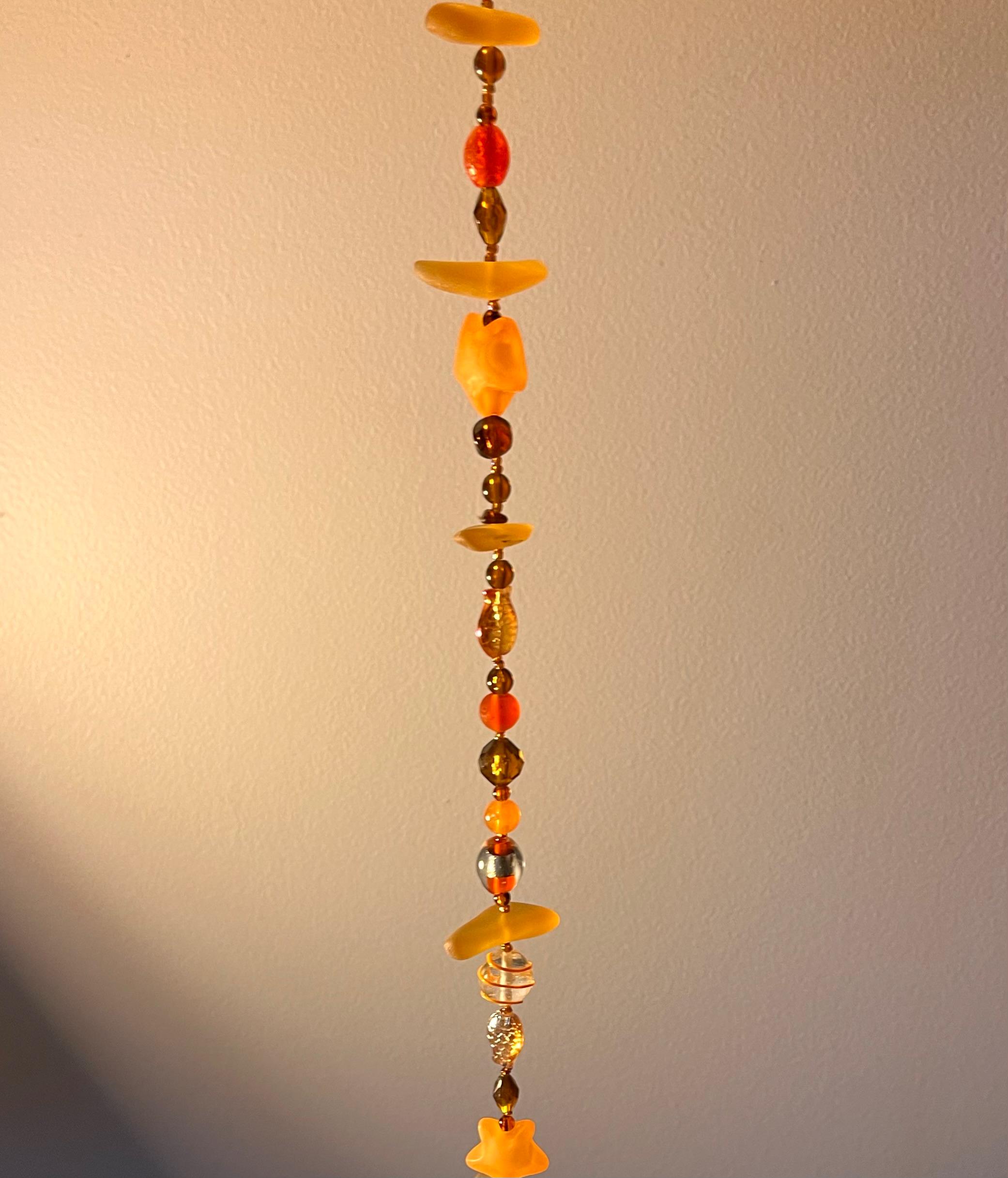 Hand-made sea-glass suncatcher.