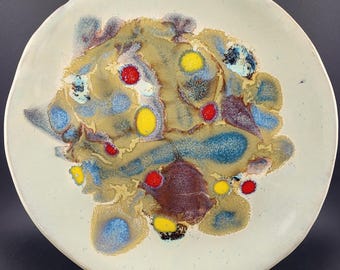 Set di 4 piatti piani in ceramica artistica realizzati a mano.
