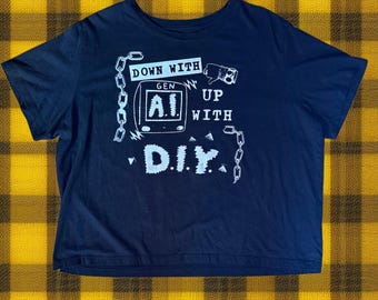 Down with Gen AI up with DIY screen printed upcycled second hand black cropped t shirt women’s 2XL