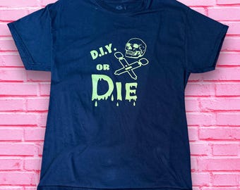 Upcycled Second Hand Black T Shirt “D.I.Y. or DIE” with Hitatchi Wand Skull and Cross Bones Labeled Large