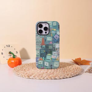 May include: A set of three ceramic mugs with a speckled, matte finish in cream, light grey, and dark grey. Each mug has a simple, minimalist design, suitable for coffee or tea.