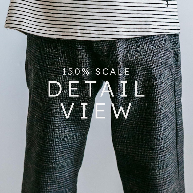 May include: Close-up of gray and black patterned pants with the text "150% SCALE DETAIL VIEW" in white. The pants are paired with a striped black and white top. The image focuses on the texture and detail of the clothing.