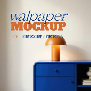 May include: A modern orange table lamp with a mushroom-shaped shade sits atop a vibrant blue cabinet. The image features the text "wallpaper MOCKUP" in blue and orange, along with "4K PHOTOSHOP / PHOTOPAE".