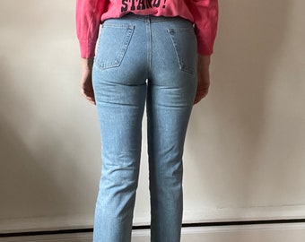 High waist straight leg 90s DKNY light wash jeans raw hem 26 waist